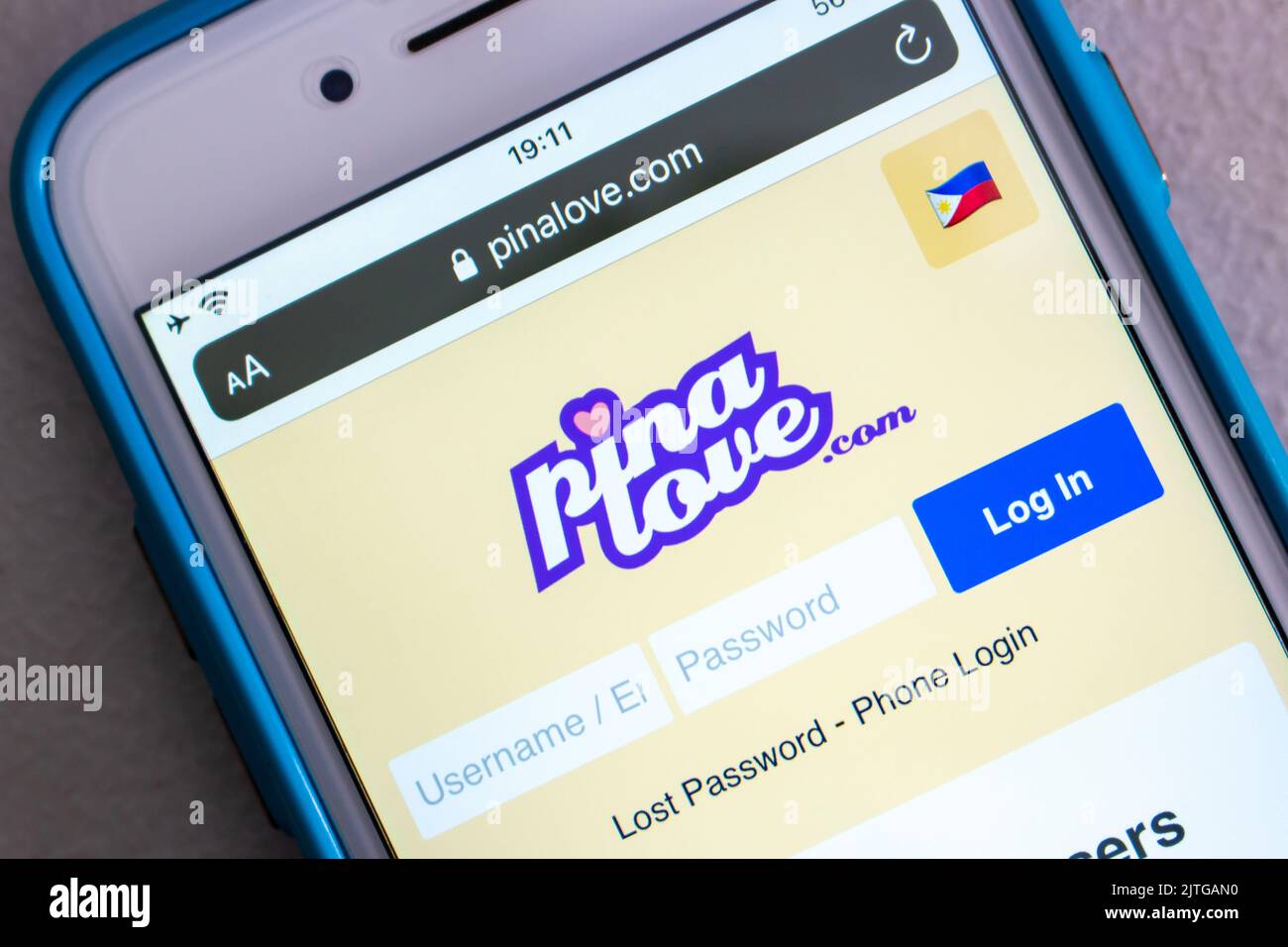 Website of PinaLove on iPhone. PinaLove is a free Filipina dating website that allows users to find friends or love in the Philippines Stock Photo