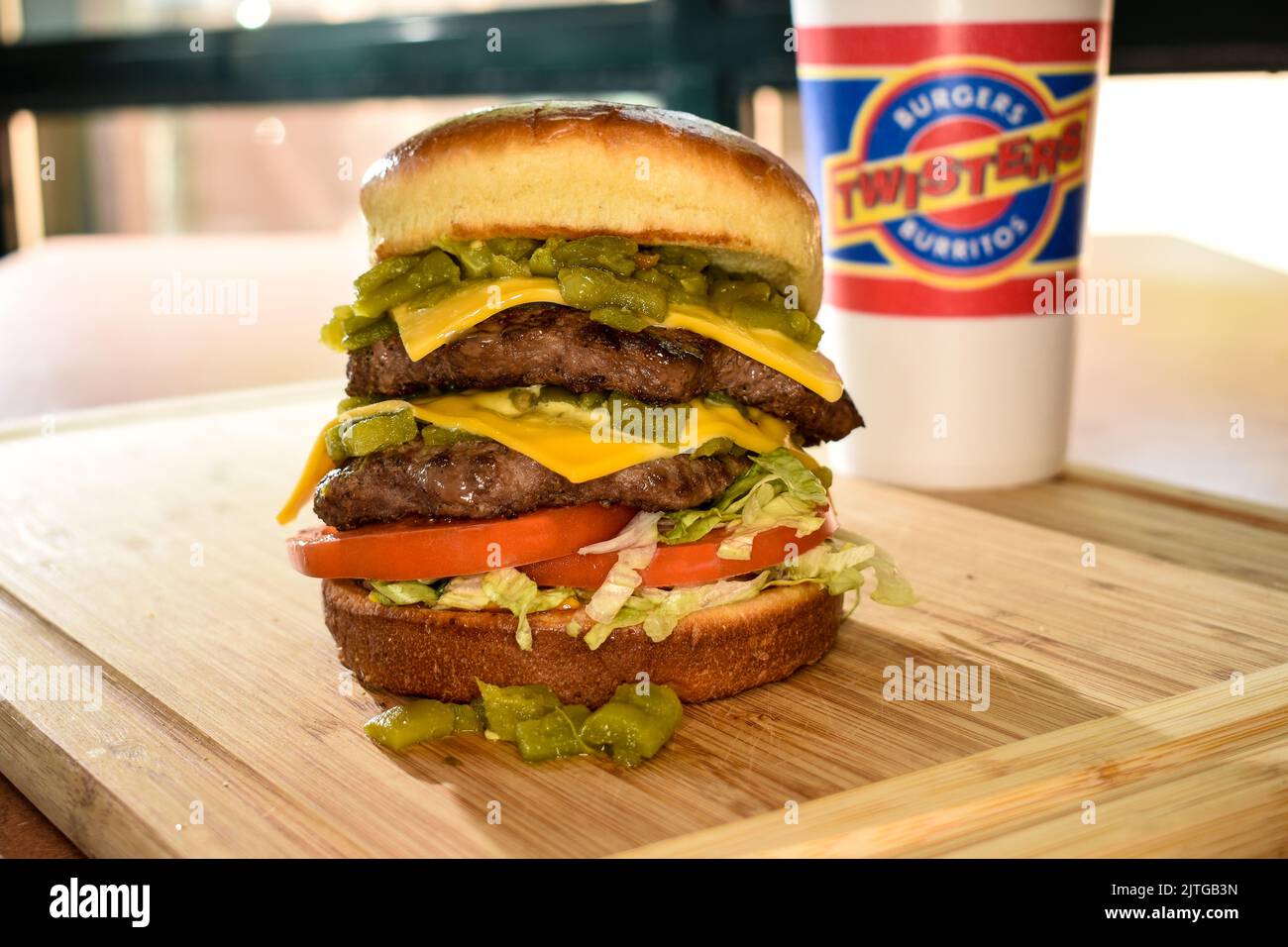 Twister's green chile double cheeseburger Stock Photo Alamy