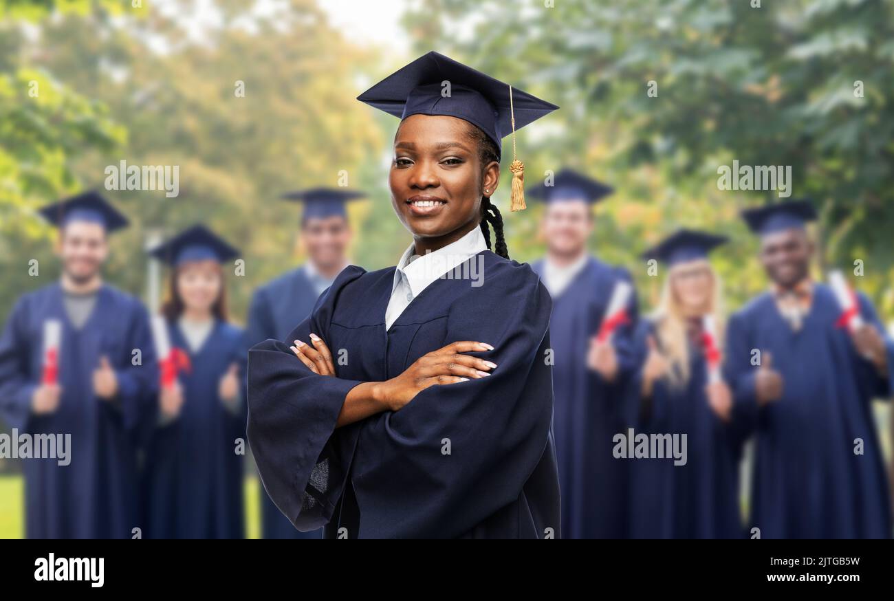 happy female graduate student in mortarboard Stock Photo - Alamy
