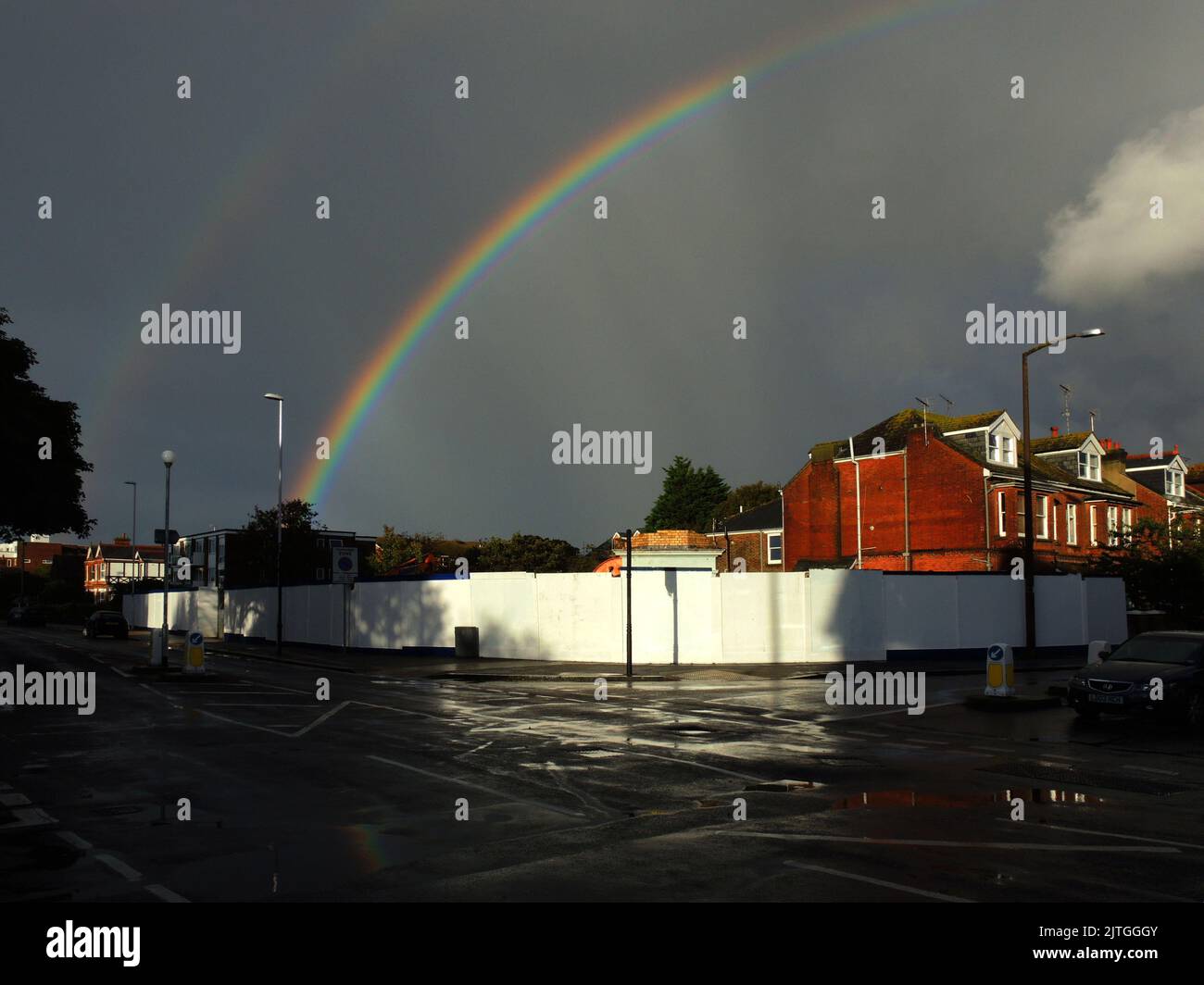 AJAXNETPHOTO. 2013. WORTHING, ENGLAND. - RAINBOW - FORMING OVER TOWN FOLLOWING RAINSTORM. PHOTO:JONATHAN EASTLAND/AJAX REF:P78 132810 56 Stock Photo