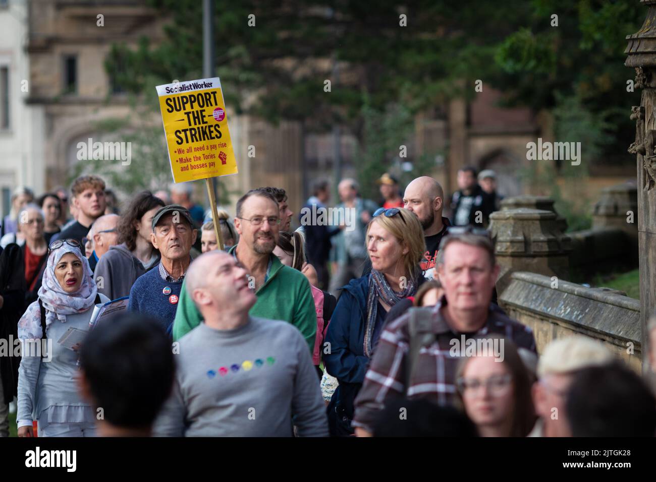 Manchester, UK. 30th Aug, 2022. People queue up to enter the cathedral for the sold-out campaign movement event, Enough Is Enough. Faith leaders and unions come together in unity to raise support to tackle the cost of living crisis by demanding real pay rises, slashing energy bills and taxing the rich. Credit: Andy Barton/Alamy Live News Stock Photo