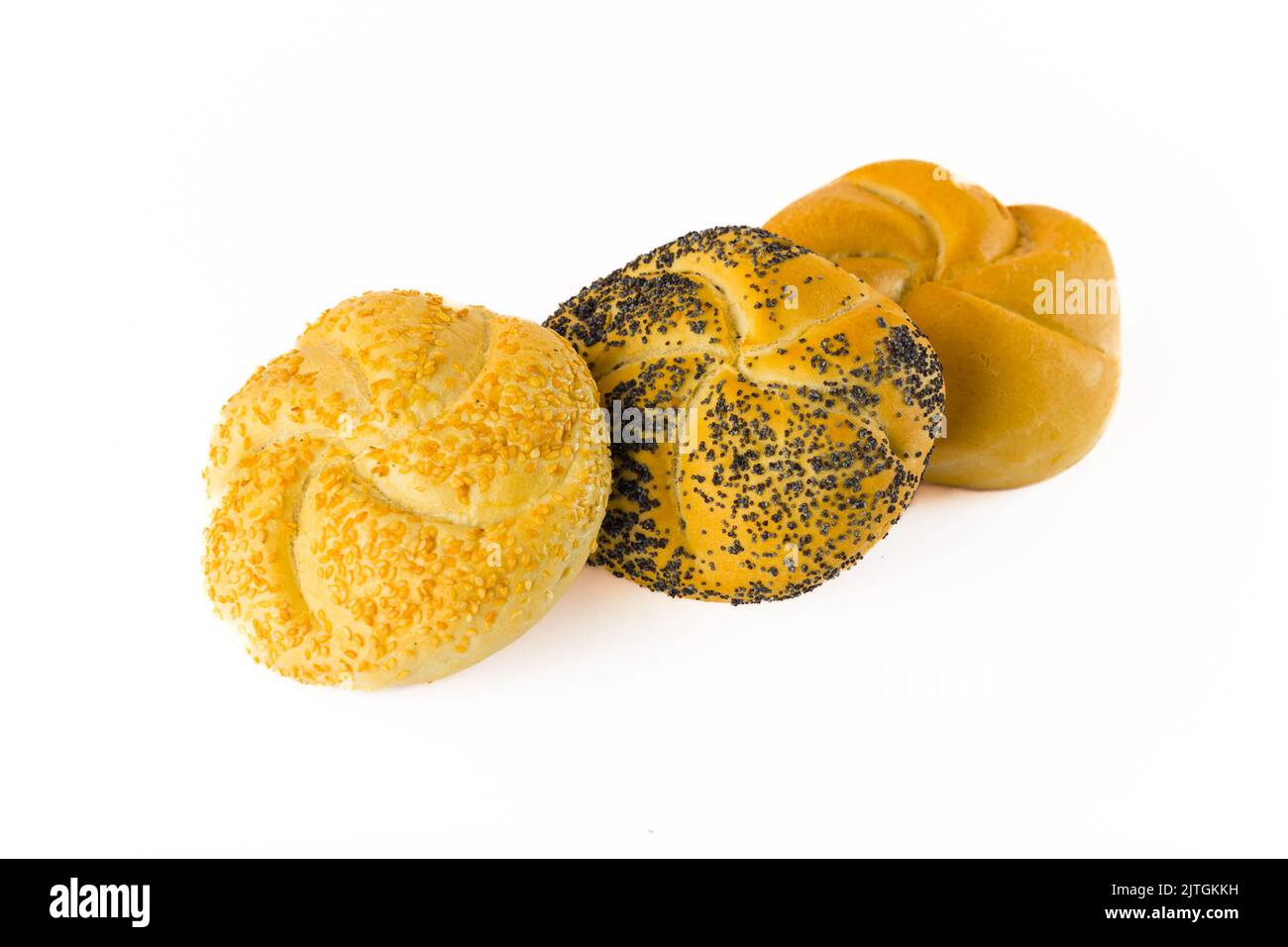 Three fresh kaiser rolls placed in front of each other. Traditional one
