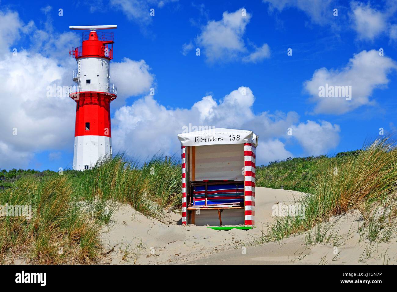 Electric lighthouse of the island Borkum with beach chair, Germany, Lower Saxony, Borkum Stock Photo