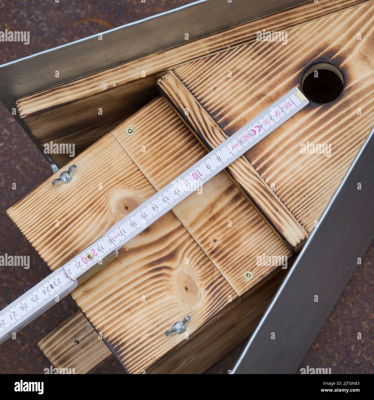 nest box series: the height from the bottom of the nest box to the lower edge of the entrance hole should be at least 17 cm Stock Photo