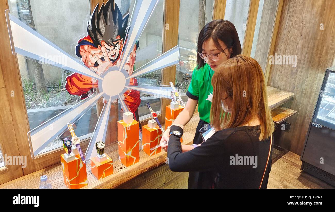 SHANGHAI, CHINA - AUGUST 30, 2022 - The SWATCH X DRAGON BALL Z series co-branded watch products are displayed in Shanghai, China, on Aug 30, 2022. Swi Stock Photo