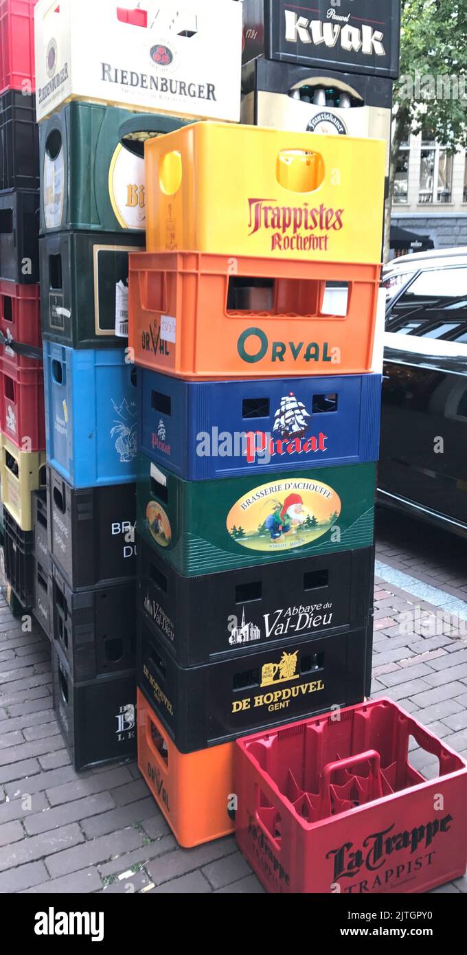 Stack of empty colourful European beer bottle crates Stock Photo Alamy