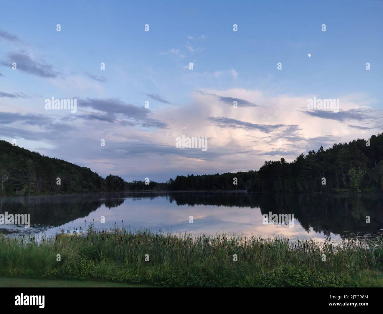 A beautiful scene of a lake in Algonquin Park in Canada with forests