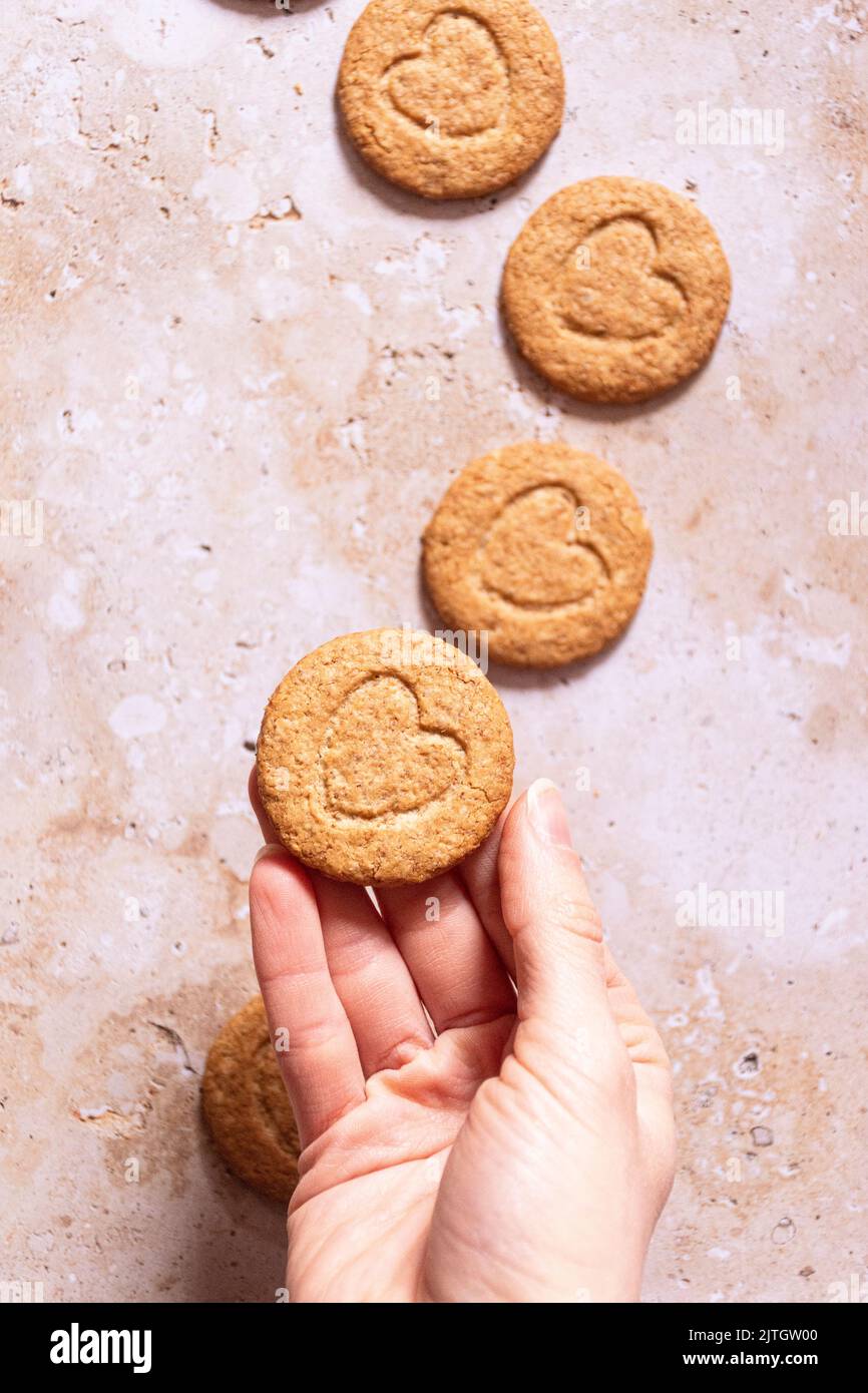 heart shaped cookies in hand Stock Photo