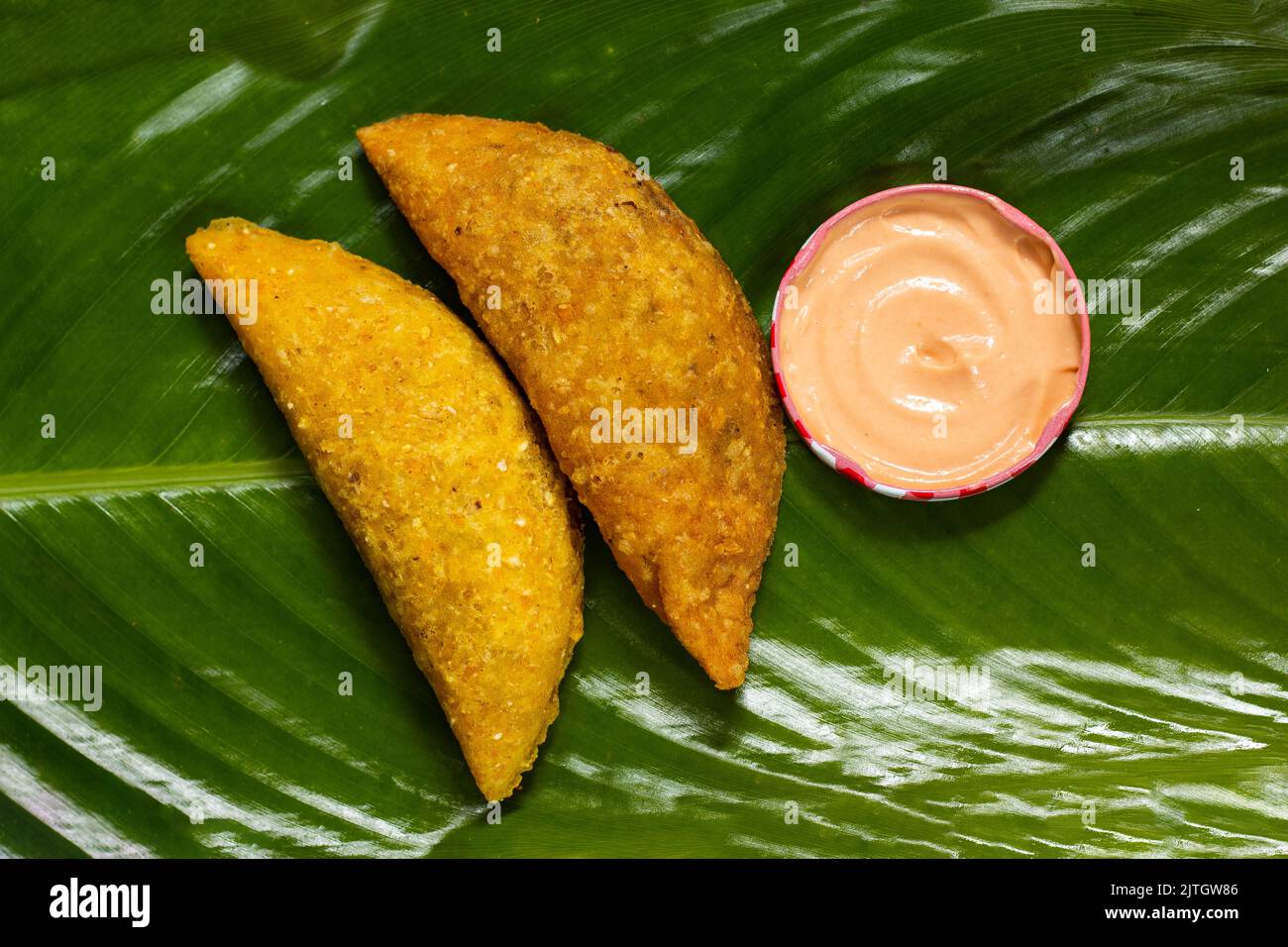 delicious empanada made of corn and stuffed with meat and potatoes