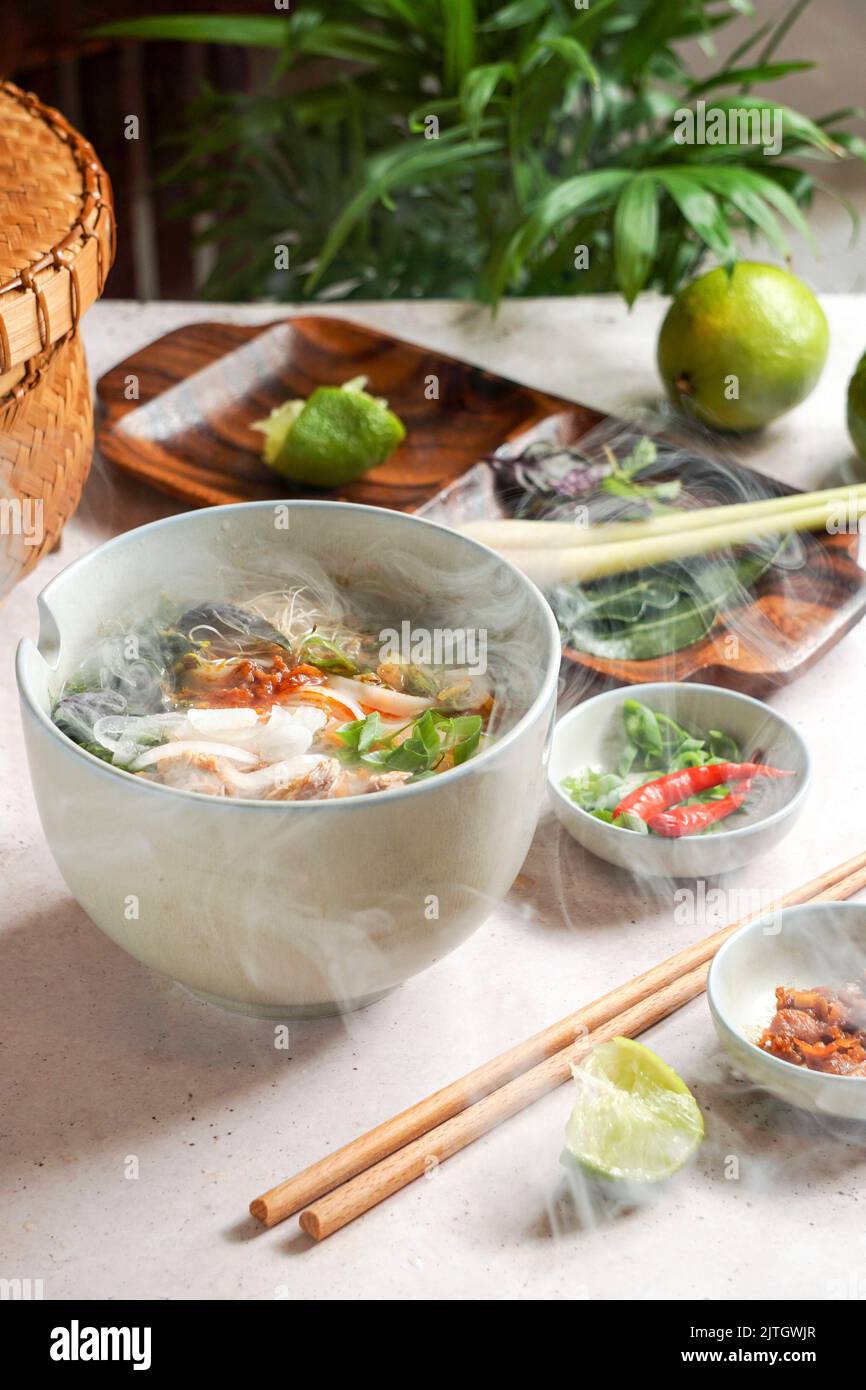 Bun Bo Hue, Bun Bo, Vietnamese beef noodle soup spicy. bowl of beef and