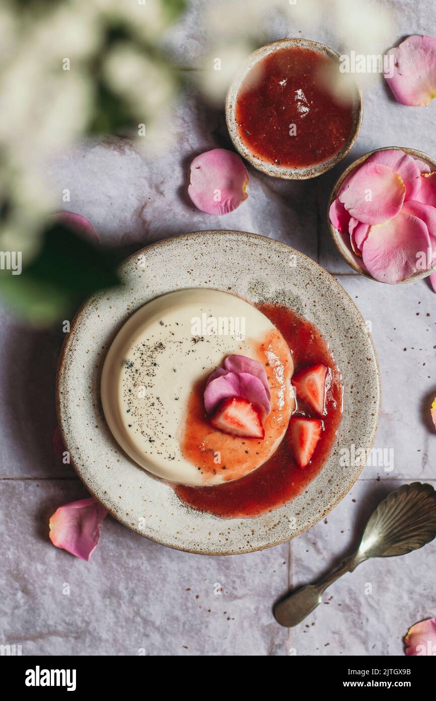 Rose panna cotta with strawberry rhubarb compote Stock Photo