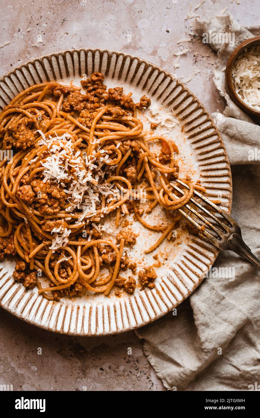 Half eaten pasta bolognese plate Stock Photo Alamy