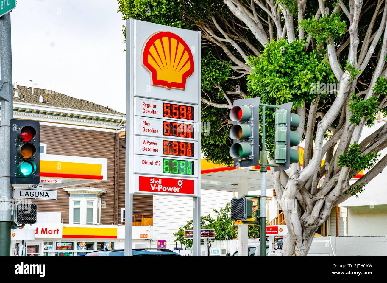 Petrol or gasoline prices displayed on a board on the entrance to the