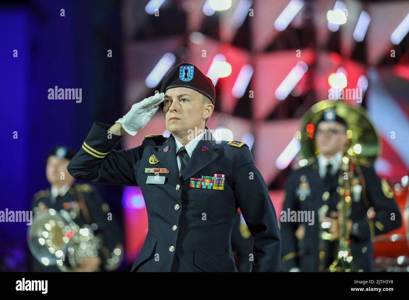 Vilnius, Lithuania. 27th Aug, 2022. U.S. Army Warrant Officer Cena Duran, commander of the 1st Infantry Division Band, salutes during the inAugustural military tattoo at Vilnius, Lithuania, August. 27, 2022. The Big Red One Band is among other units assigned to the 1st Infantry Division, proudly performing alongside NATO allies during a historical, inAugustural military tattoo hosted by Lithuanian Armed Forces. Credit: U.S. Army/ZUMA Press Wire Service/ZUMAPRESS.com/Alamy Live News Stock Photo