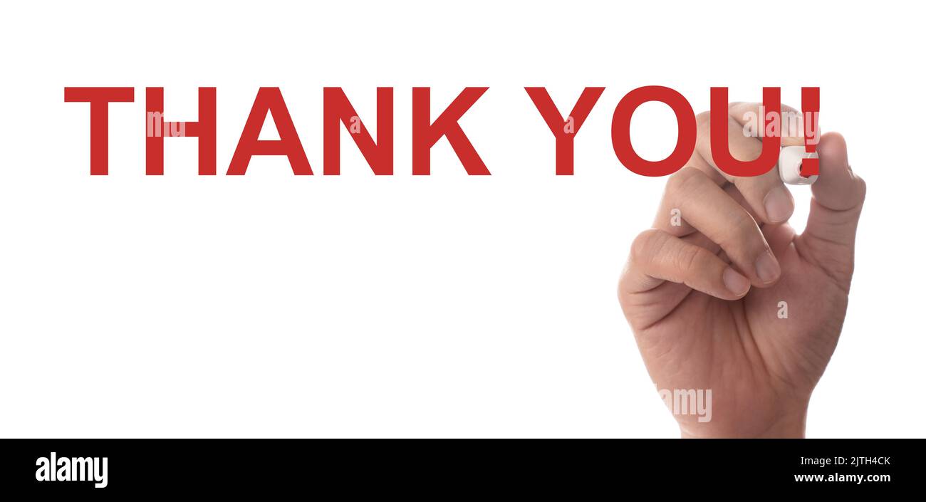 Hand writing Thank You with red marker Stock Photo