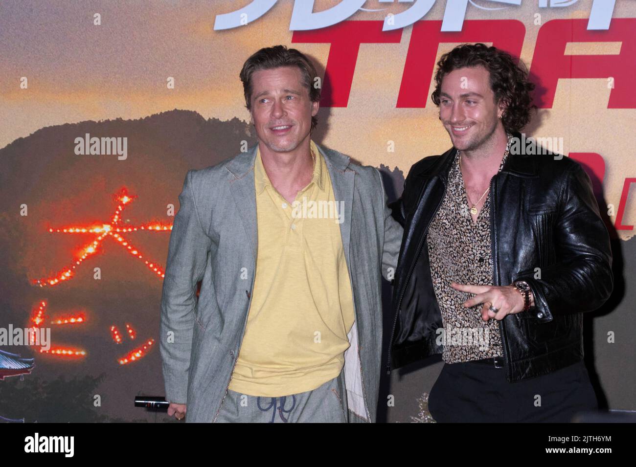 Actor Aaron Taylor-Johnson and Brad Pitt attend the stage greeting for 'Bullet Train' in Kyoto-Prefecture, Japan on August 23, 2022. Credit: AFLO/Alamy Live News Stock Photo