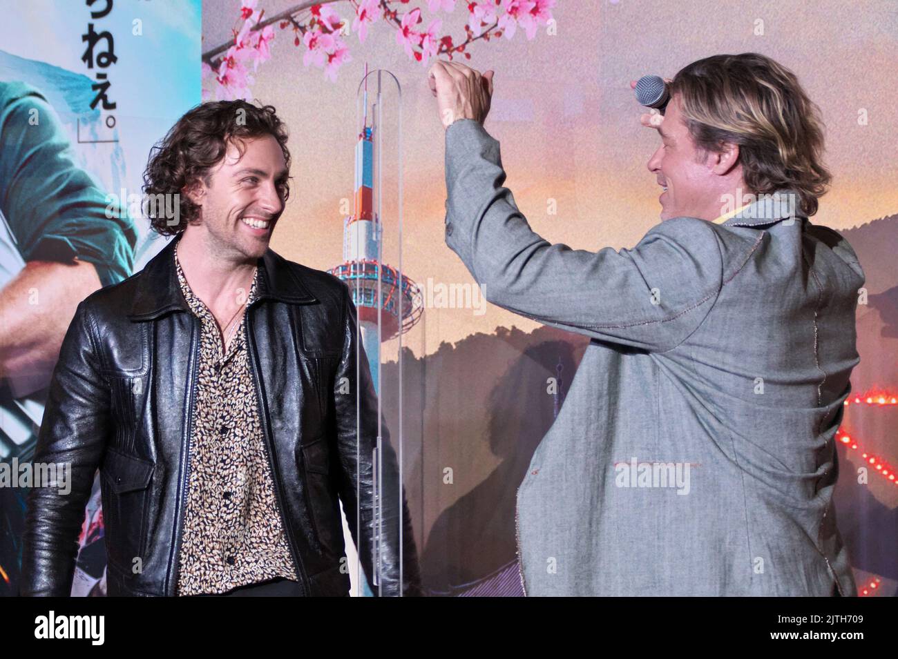Actor Aaron Taylor-Johnson and Brad Pitt attend the stage greeting for 'Bullet Train' in Kyoto-Prefecture, Japan on August 23, 2022. Credit: AFLO/Alamy Live News Stock Photo