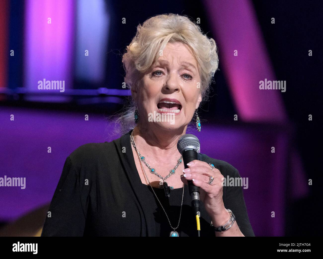 Connie Smith onstage celebrating Barbara Mandrell's 50th Anniversary as