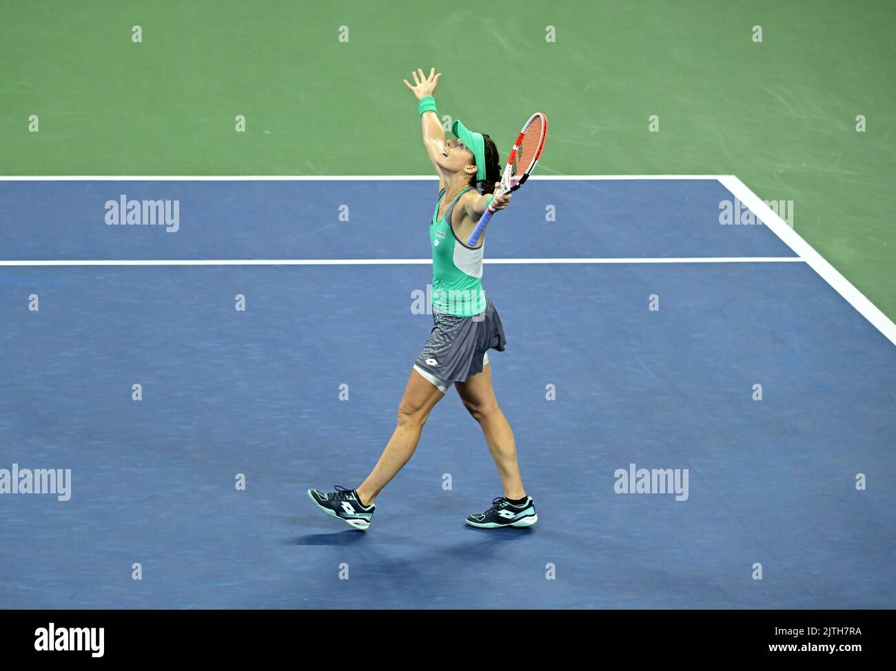 Alize Cornet celebrates beating Emma Raducanu during day two of the US Open at the USTA Billie Jean King National Tennis Center, New York. Picture date: Tuesday August 30, 2022. Stock Photo