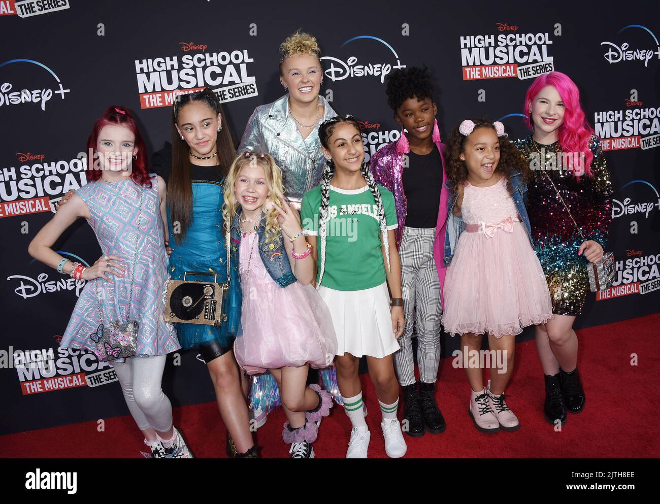 JoJo Siwa and XOMG POP, Bella Llerena, Brooklyn Pitts, Dallas Skye, Kinley Cunningham, Kiya Barczyszyn, Leigha Sanderson and Tinie T arriving to the 'High School Musical: The Musical Series' Season 3 Premiere held on July 27, 2022 Burbank, California © Janet Gough / AFF-USA.com Stock Photo