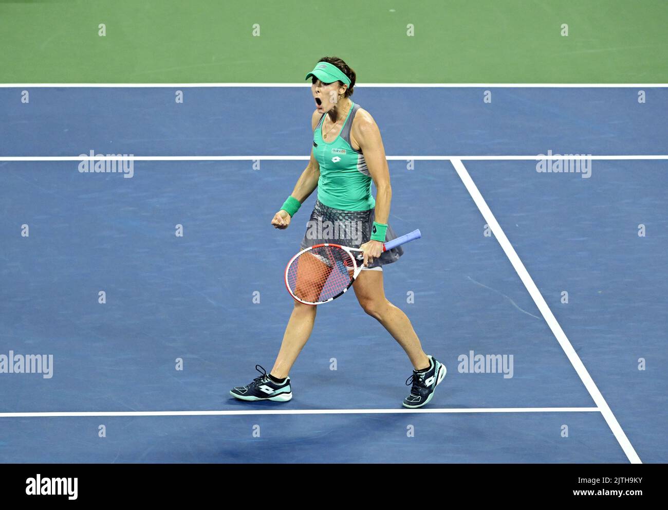 Alize celebrates beating Emma Raducanu during day two of the US