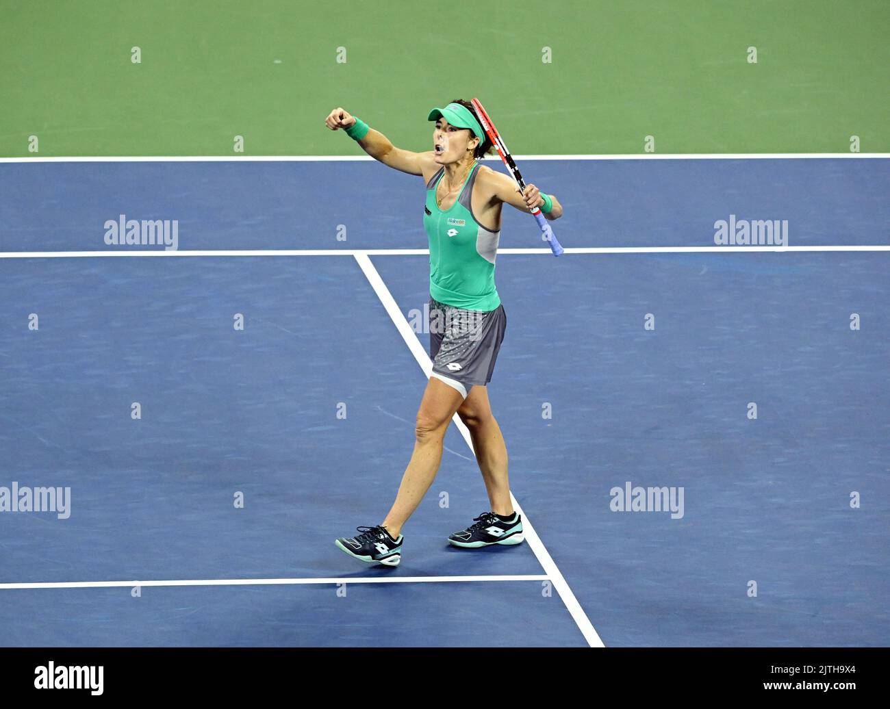 Alize celebrates beating Emma Raducanu during day two of the US