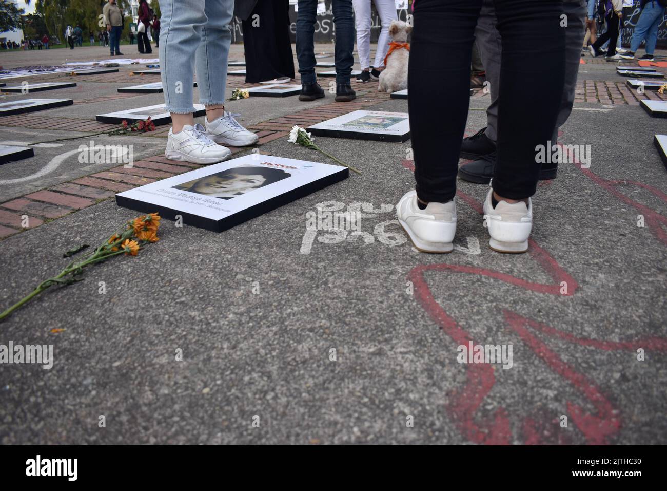 Bogota, Colombia, August 30, 2022. Photos of victims of enforced disapearances are seen with the word phrase 'Never Forgotten' during the framework of the International Day of the Victims of Enforced Disappearances in Bogota, Colombia, August 30, 2022. According to Colombia's Victims unit more than 130.000 people had been indirect victims of Enforced Disappearances in Colombia and at least 50.000 had been direct victims of this crime. Photo by: Cristian Bayona/Long Visual Press Stock Photo