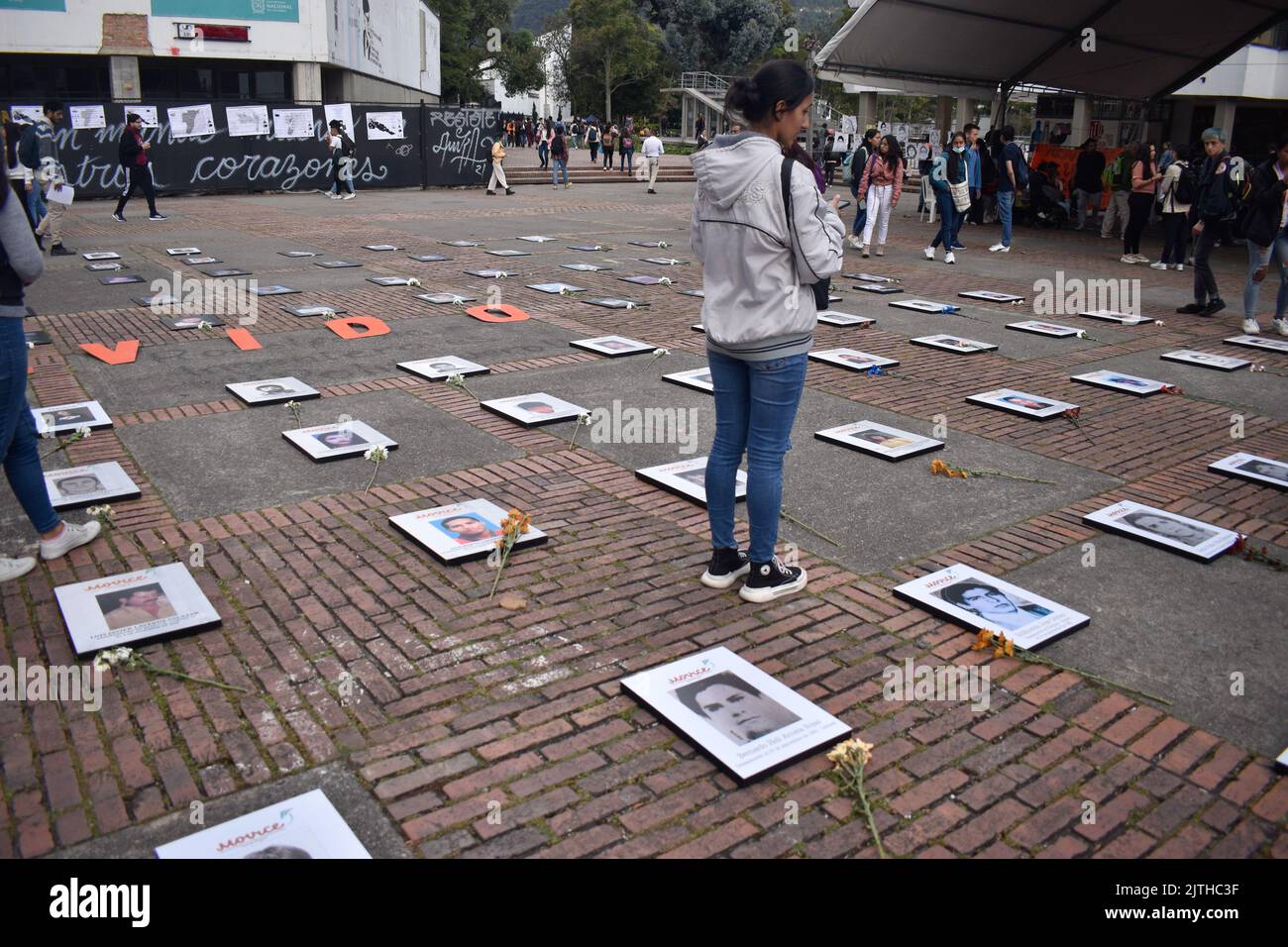 Bogota, Colombia, August 30, 2022. Photos of victims of enforced disapearances are seen with the word phrase 'Never Forgotten' during the framework of the International Day of the Victims of Enforced Disappearances in Bogota, Colombia, August 30, 2022. According to Colombia's Victims unit more than 130.000 people had been indirect victims of Enforced Disappearances in Colombia and at least 50.000 had been direct victims of this crime. Photo by: Cristian Bayona/Long Visual Press Stock Photo