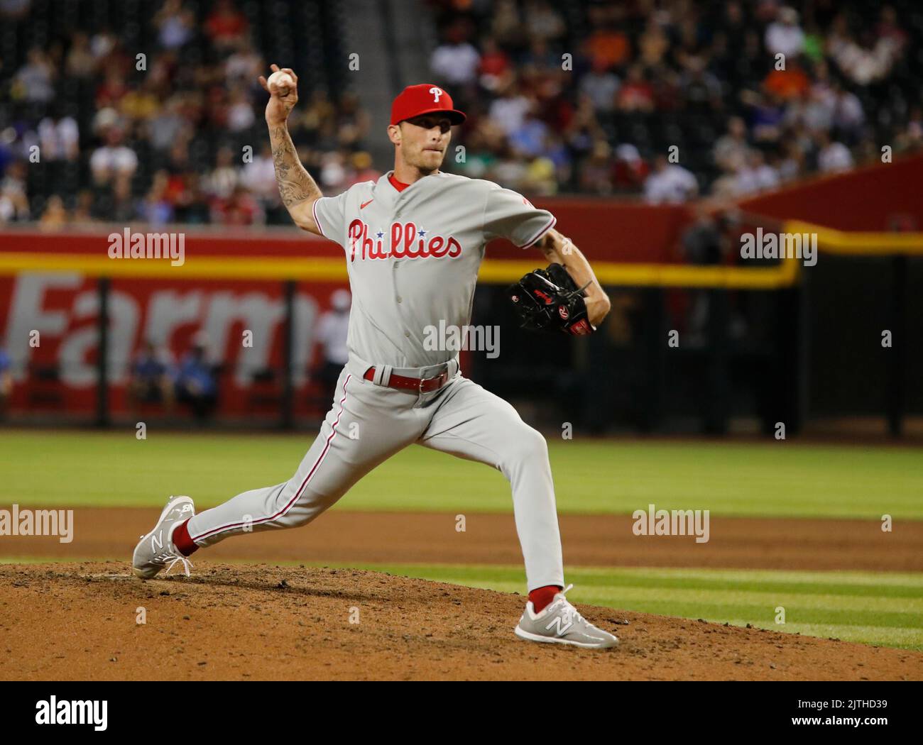 Philadelphia Phillies relief pitcher Connor Brogdon (75) delivers a pitch  in the bottom of the seventh inning in a baseball game against the Texas  Rangers in Arlington, Texas, Sunday, April 2, 2023. (