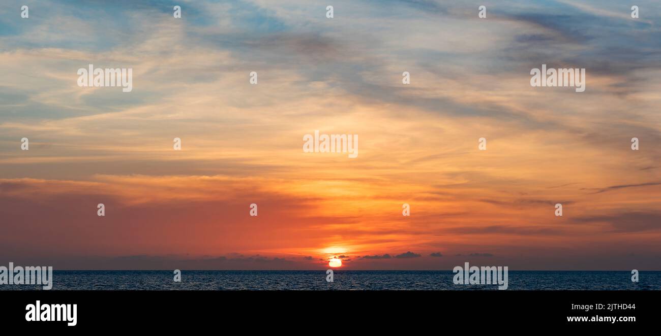 Sunset on the tropical sea beach. Stock Photo