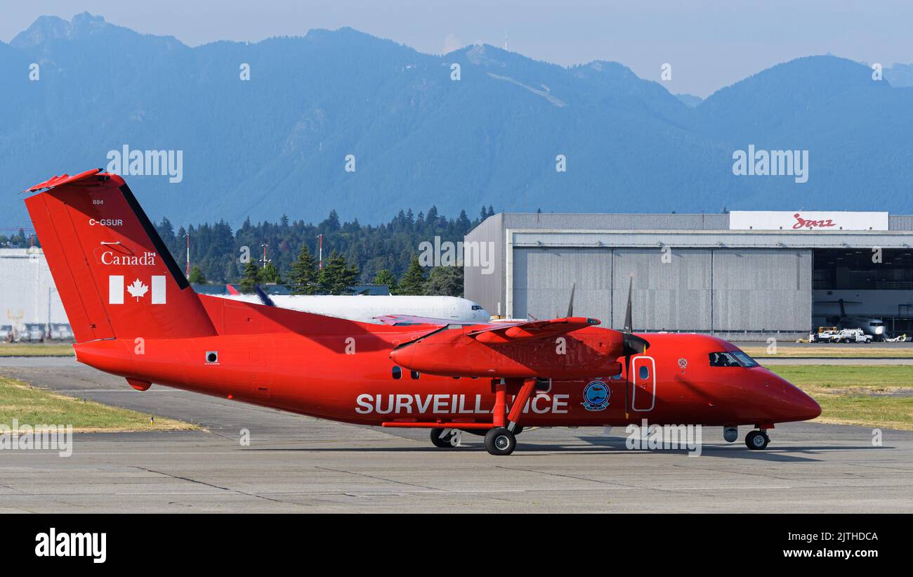 Richmond, British Columbia, Canada. 20th Aug, 2022. A Transport Canada De Havilland Dash 8 plane (C-GSUR) taxiing at Vancouver International Airport. The aircraft is used as part of the National Aerial Surveillance Program (NASP) to monitor marine traffic and watch for illegal discharges and oil spills along Canada's coastline. (Credit Image: © Bayne Stanley/ZUMA Press Wire) Stock Photo