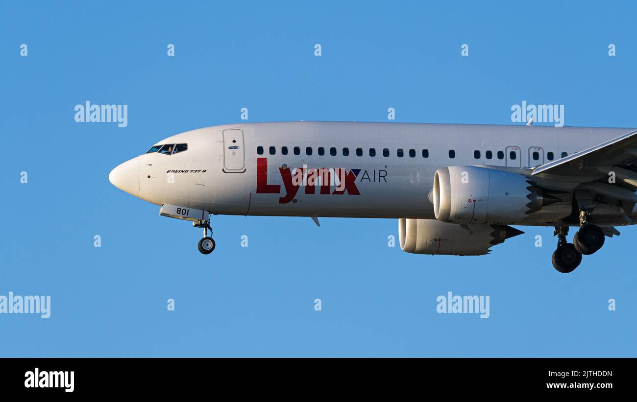 Richmond, British Columbia, Canada. 29th Aug, 2022. A Lynx Air Boeing 737 MAX 8 jetliner (C-GJSL) airborne on final approach for landing at Vancouver International Airport. (Credit Image: © Bayne Stanley/ZUMA Press Wire) Stock Photo