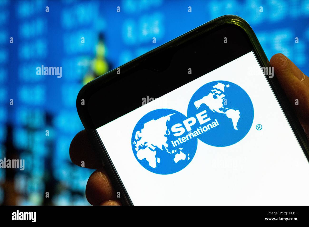 In this photo illustration, the Society of Petroleum Engineers (SPE) logo is displayed on a smartphone screen. Stock Photo