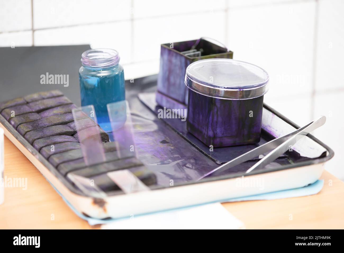 Hematoxylin and eosin solution. Blue solutions in a biochemical laboratory. Stock Photo