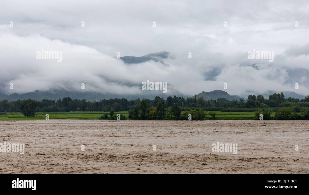 Heavy flood in the swat valley wash away agriculture fields and crops Stock Photo
