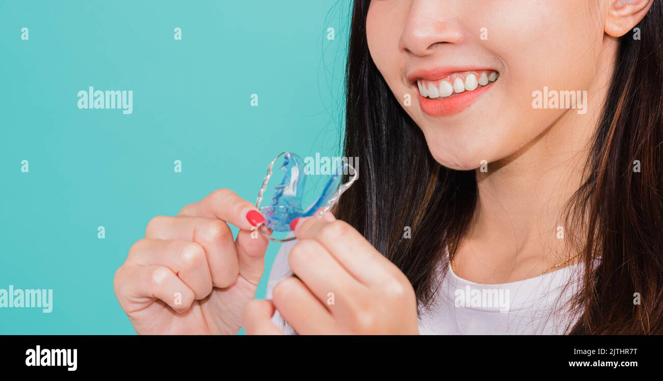 Teeth retaining tools after removable braces, Portrait young Asian