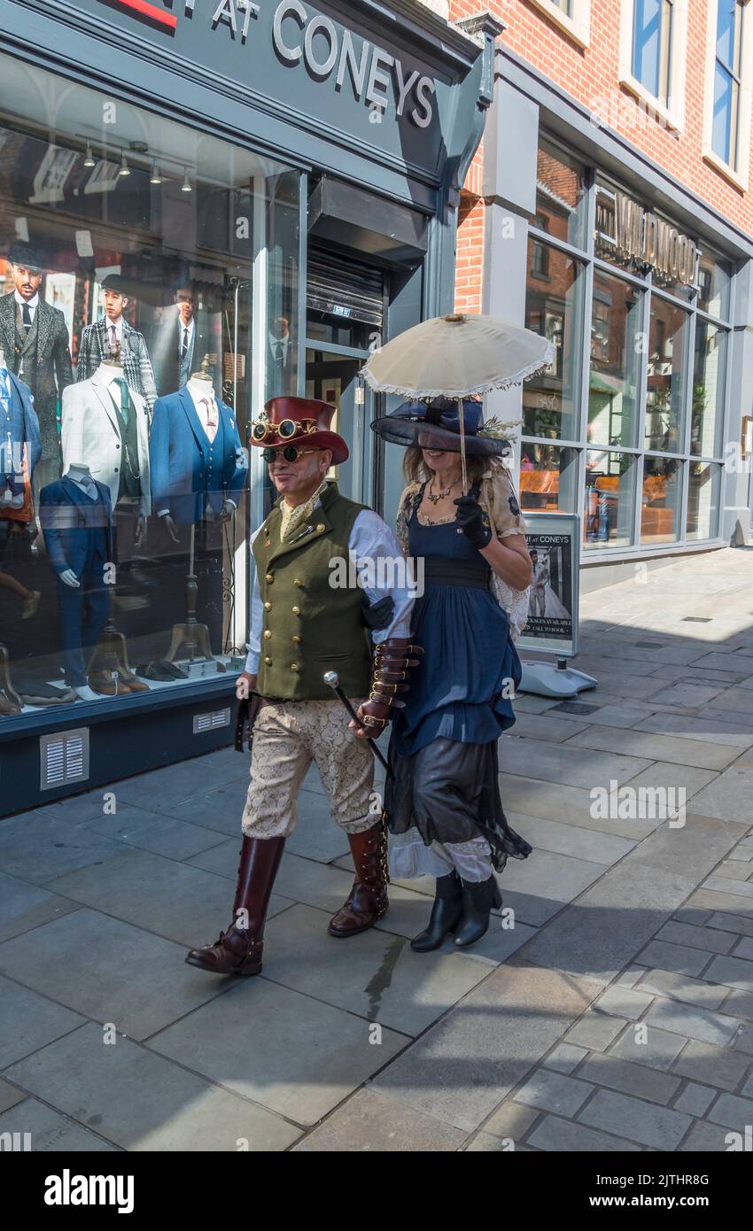 Couple dressed for the Lincoln steampunk Festival, High street Lincoln 2022 Stock Photo