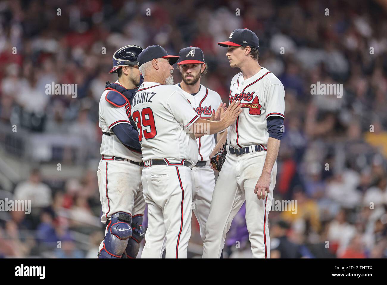 Atlanta, GA. USA; Atlanta Braves pitching coach Rick Kranitz (39) goes