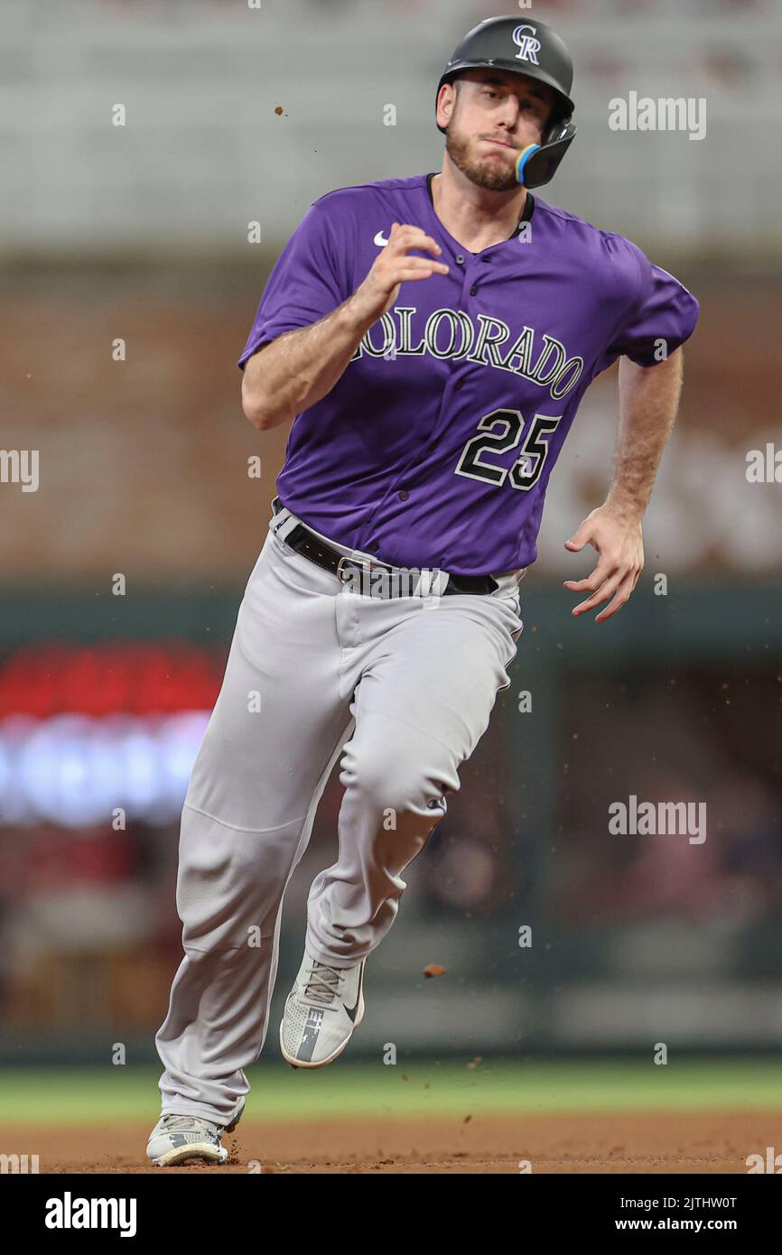 May 3 2022: Colorado first baseman C.J. Cron (25) gets a hit during the  game with Washington Nationals and Colorado Rockies held at Coors Field in  Denver Co. David Seelig/Cal Sport Medi(Credit