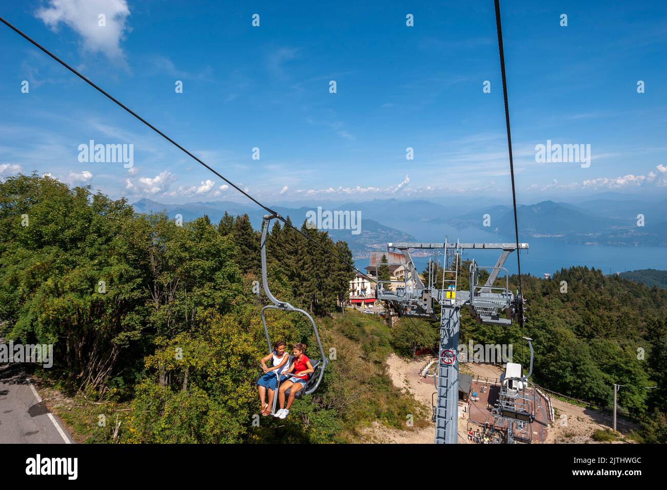 Chairlift to the top of Monte Mottarone with Lake Maggiore in the background, Stresa, Piedmont, Italy, Europe Stock Photo