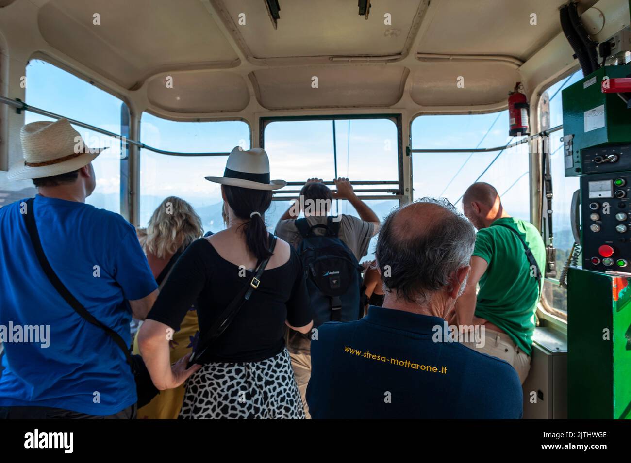 Tourists in the StresaMottarone cable car, Stresa, Piedmont, Italy