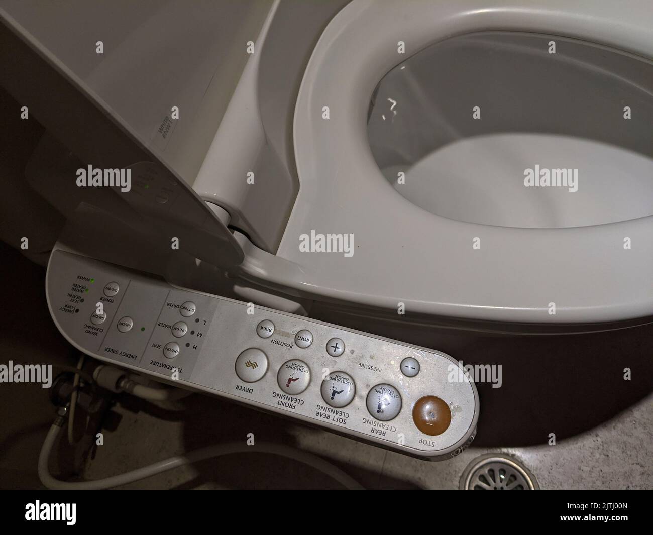 Controls of a Japanese toilet which washes, heats and dries your bottom