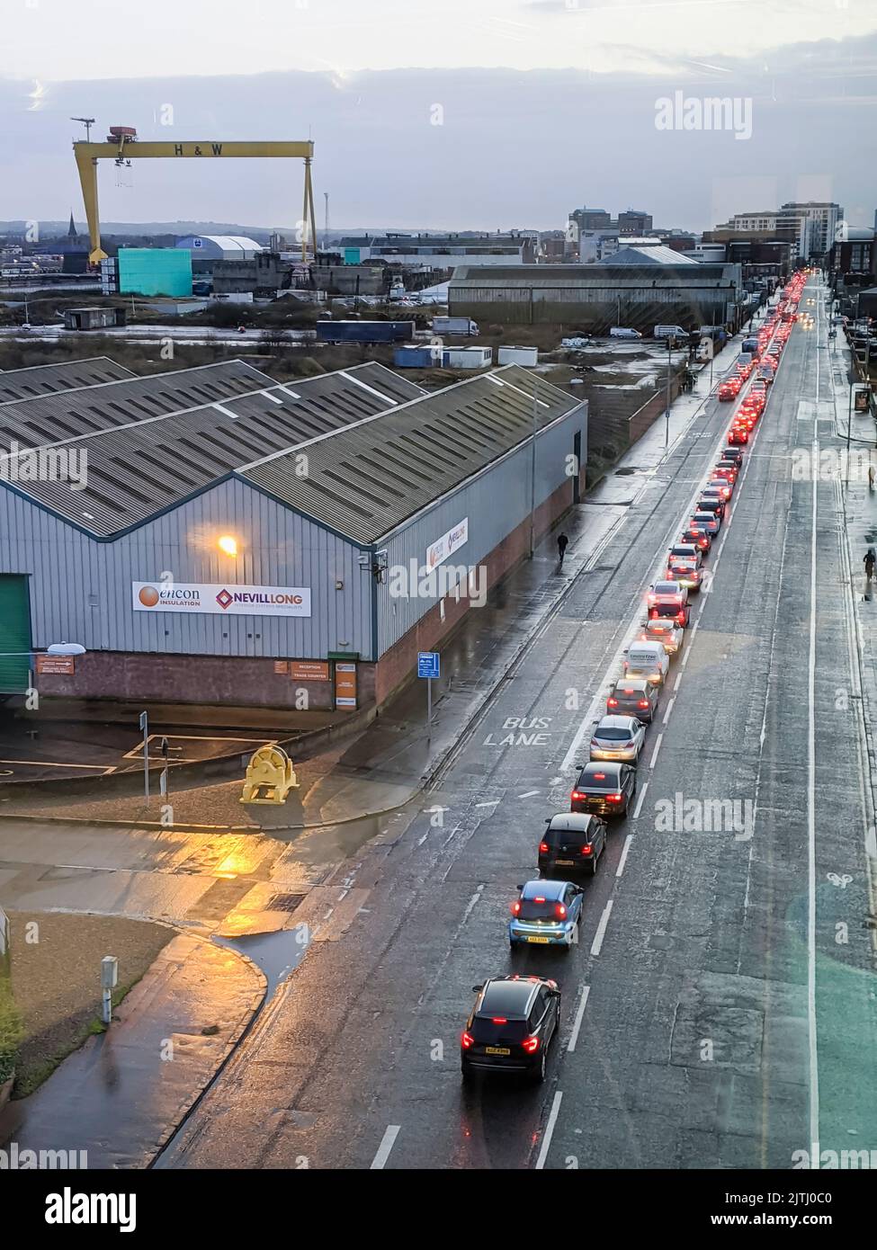 Long traffic queue along Queen's Road, Belfast during a winter evening. Stock Photo
