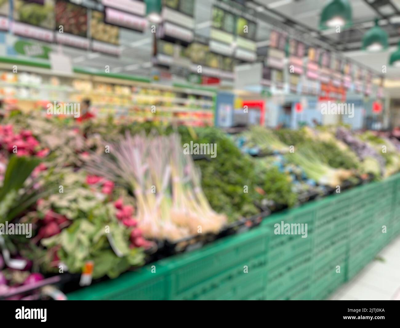 Abstract blurred supermarket vegetables aisles for background. - stock photo Stock Photo
