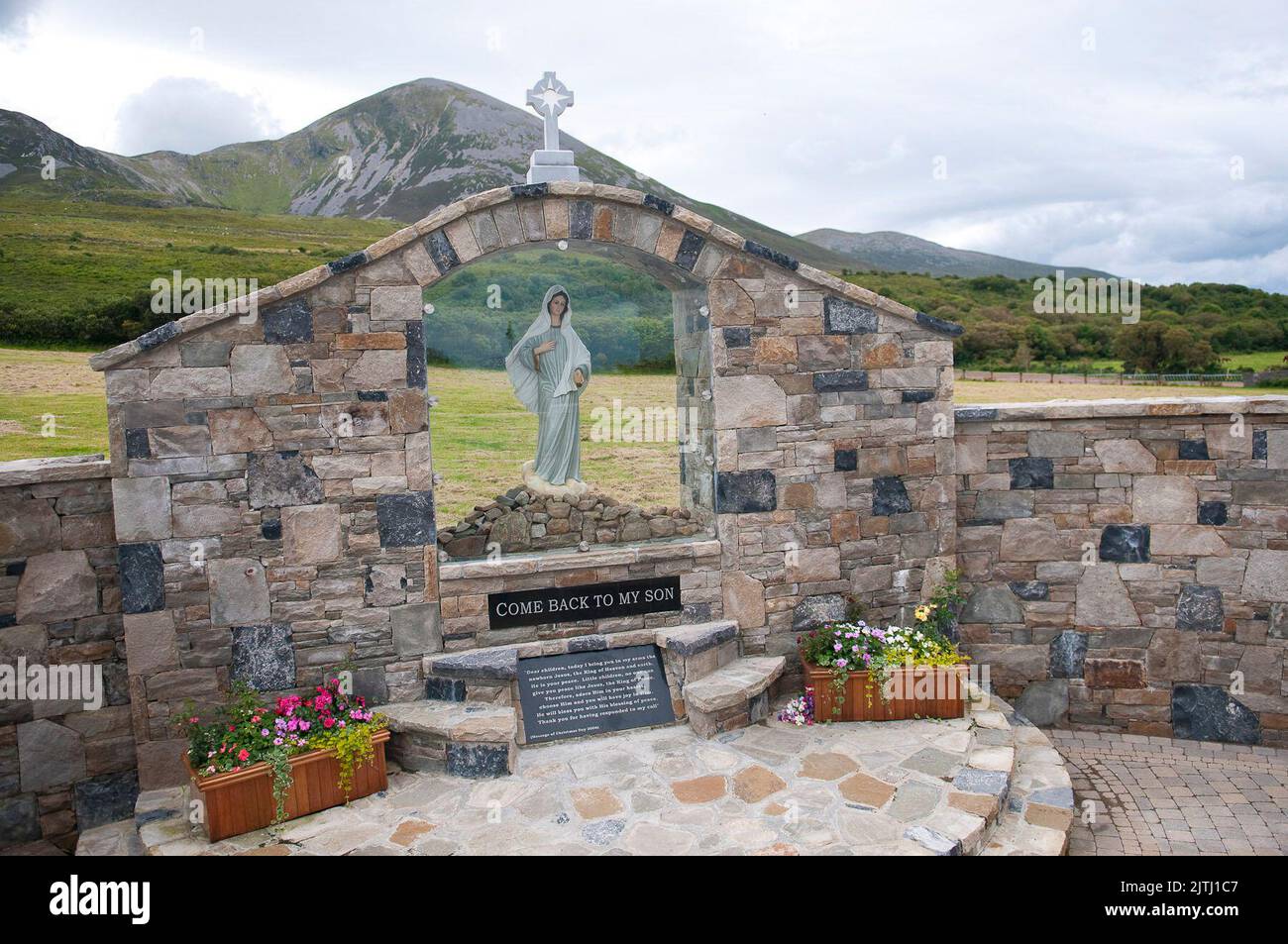 Shrine to the Virgin Mary at the foot of Croagh Patrick, from where Saint Patrick is said to have banished the snakes and lizards from Ireland, County Mayo, Republic of Ireland Stock Photo