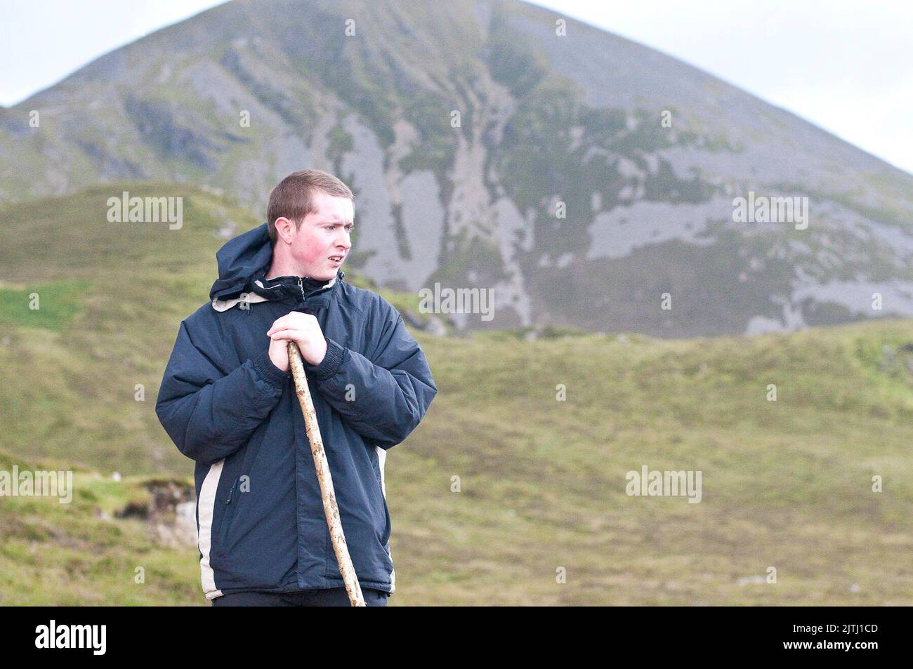 'Reek Sunday', a guelling pilgrimage up Croagh Patrick, County Mayo on the last Sunday in July each year, to visit the location where Saint Patrick stayed for 40 days, and from where his was said to have banished the lizards and snakes from Ireland. Stock Photo