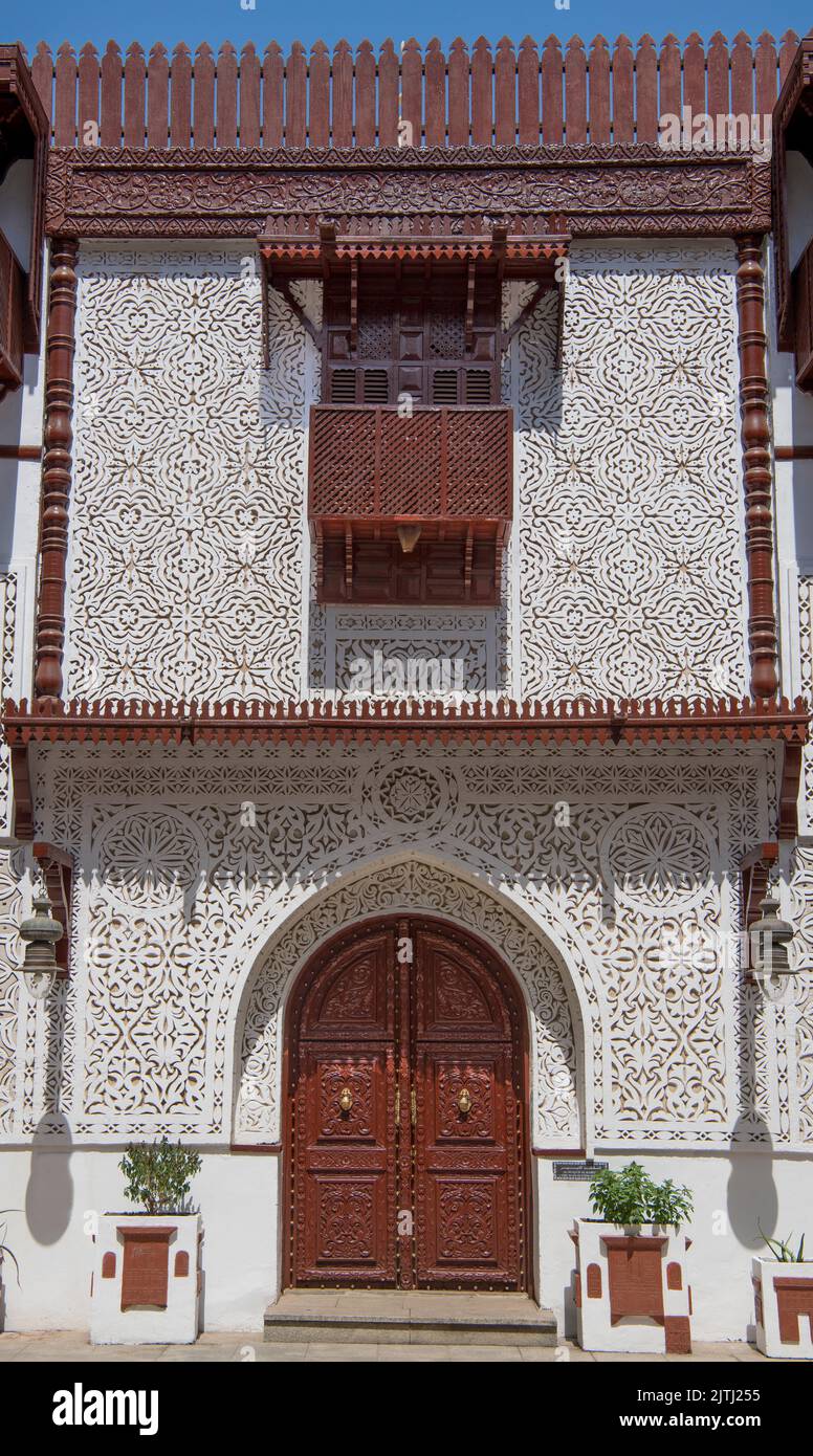 Ornate wall, balcony and door   Al Tayebat museum Jeddah Saudi Arabia Stock Photo