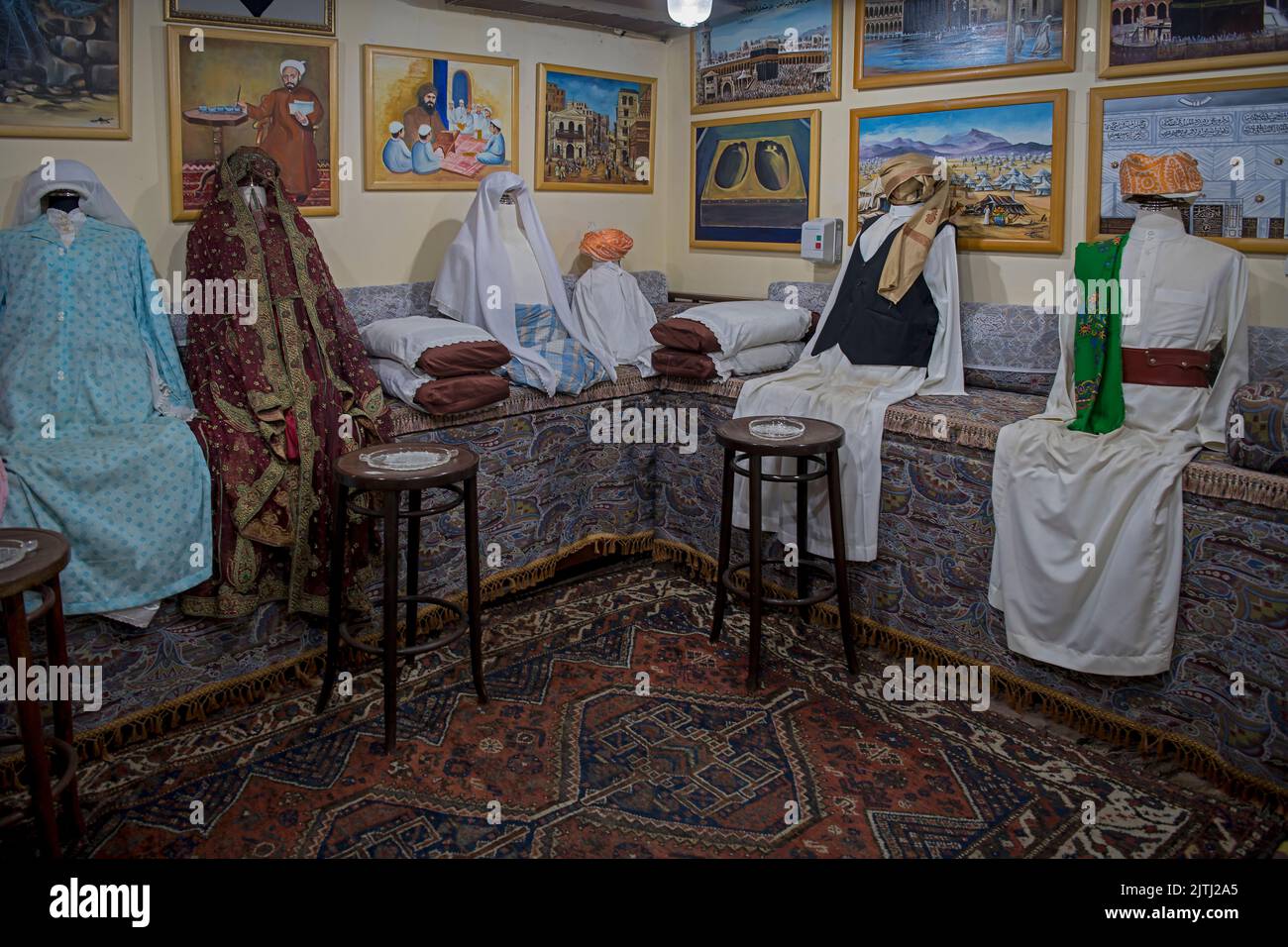 Typical interior room with models made out of textilles  and showing traditional furnishings from each province in Saudi Al Tayebat museum Jeddah Saudi Arabia Stock Photo