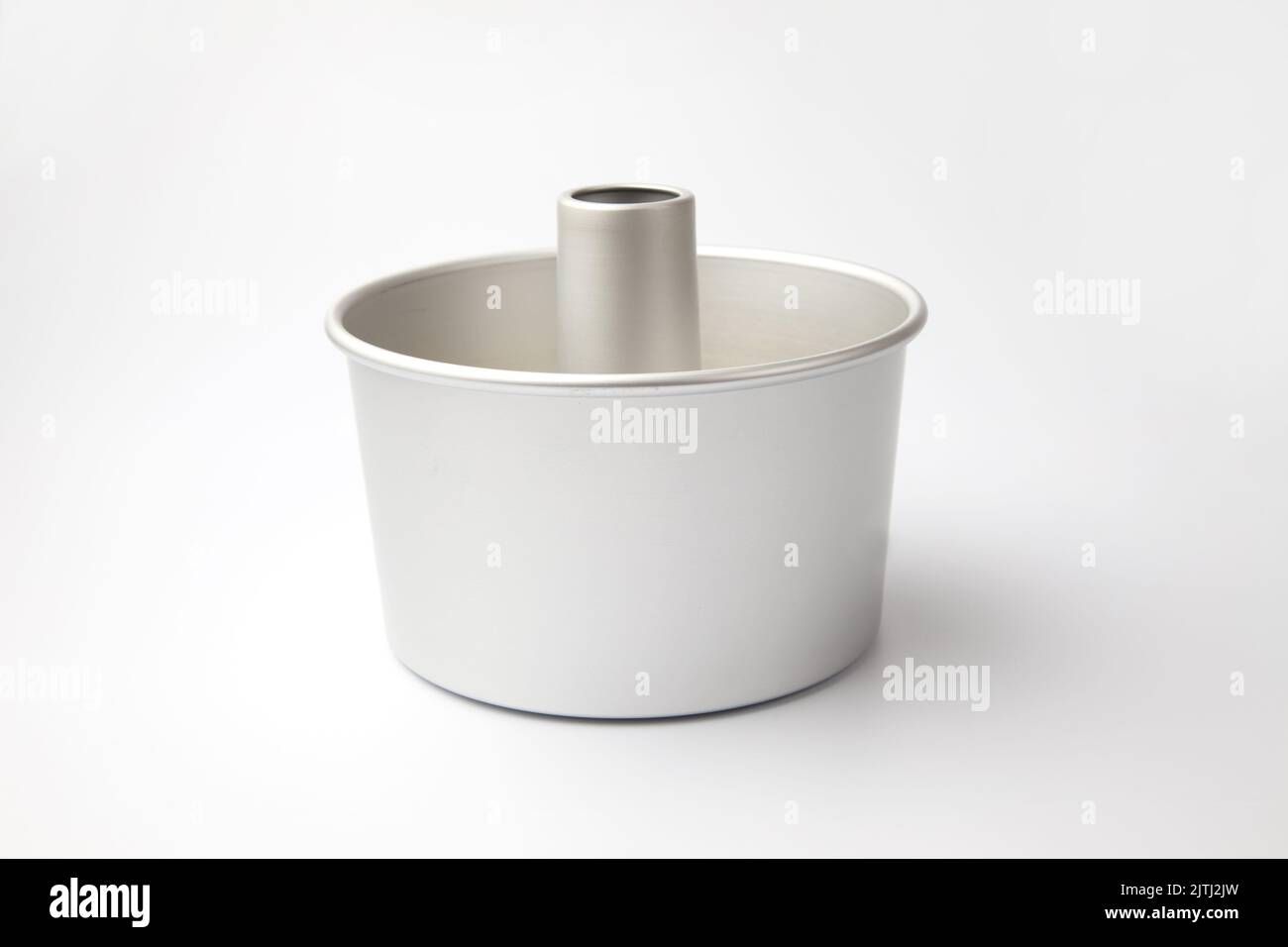 chiffon cake mold isolated on white background Stock Photo Alamy