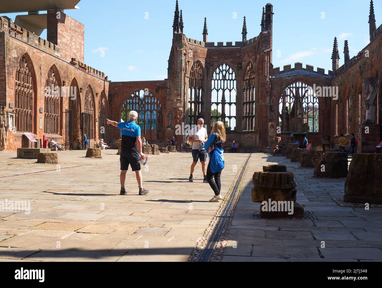Tour guides at Coventry Cathedral, UK Stock Photo